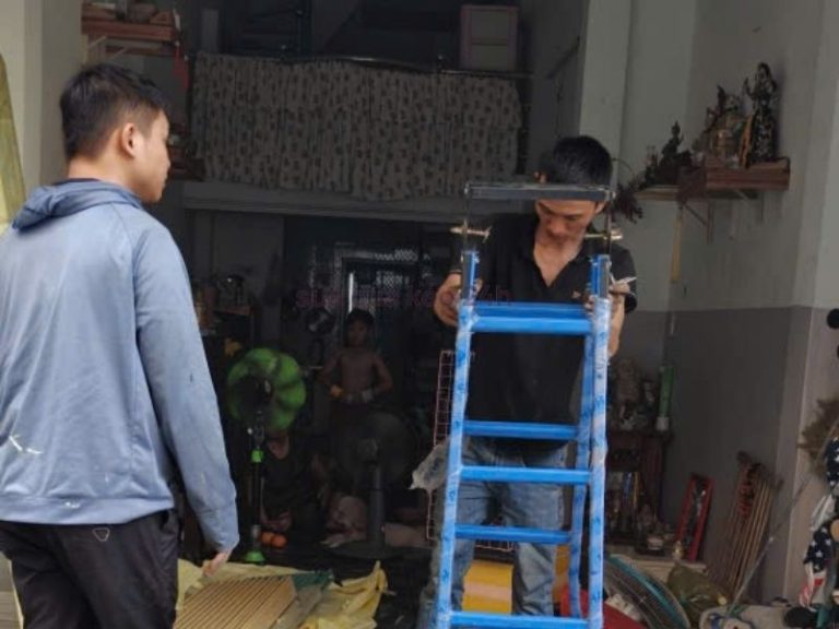 thợ sửa cửa kéo